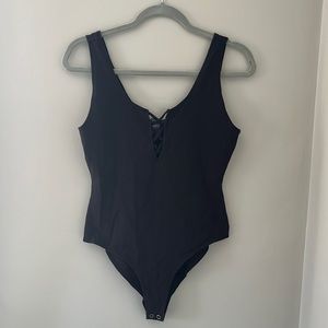Black lace-up body suit-NEVER WORN!